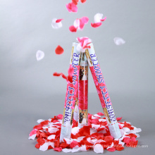 Confetti cannon party popper for wedding filled with creamy rose petals and hearts in white.
